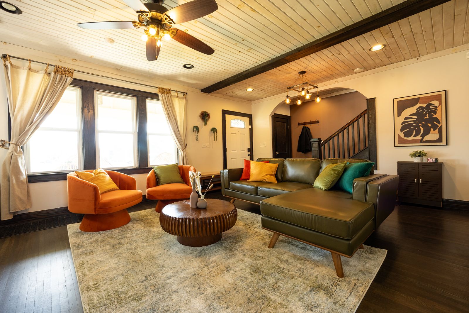 Living room with sectional and swing chair