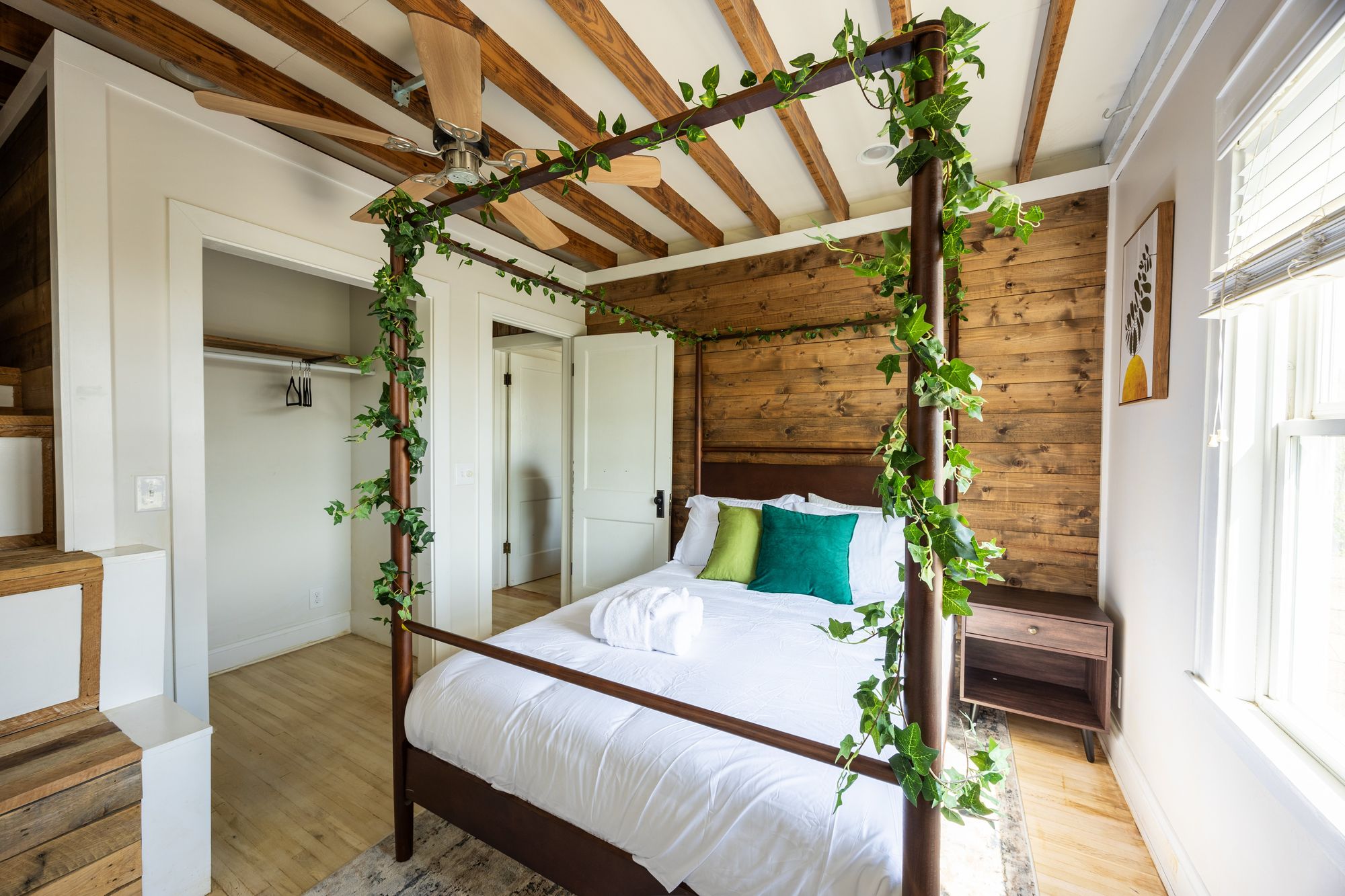 Canopy bed wrapped in ivy